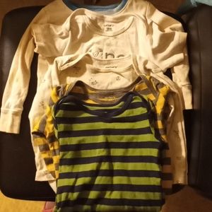 3 long sleeve 18 month onesies. 2 pj shirts.